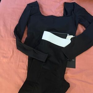 Brand new two piece Fabletics Black Leggings with White Waistband